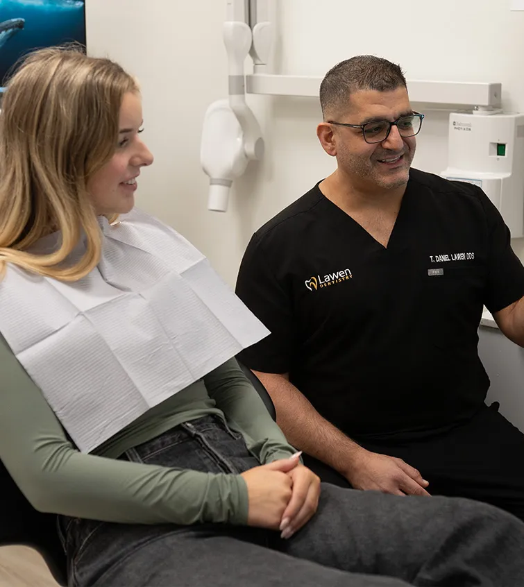 Dr Danny Lawen discussing Invisalign options with patient