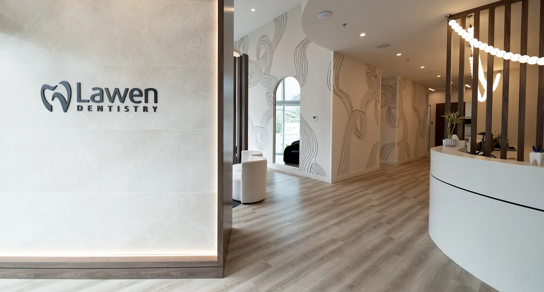 Mumford Road Dental Clinic reception area showing desk and large bright windows