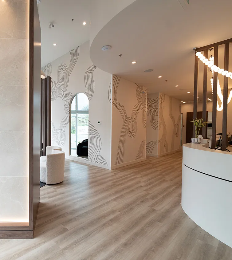Mumford Road Dental Clinic reception area showing desk and large bright windows